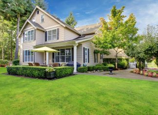 White wooden two storey house