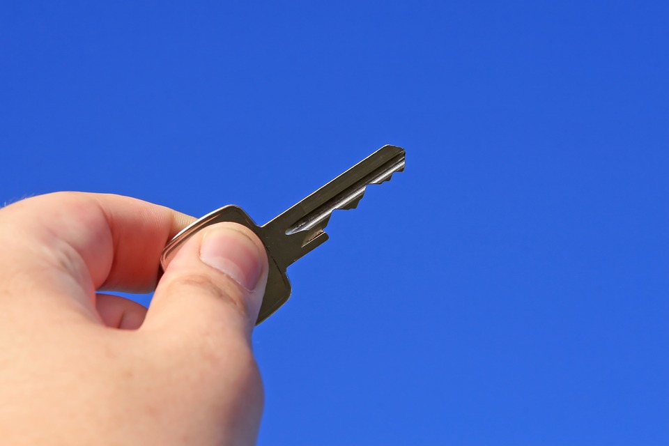 Person holding a key